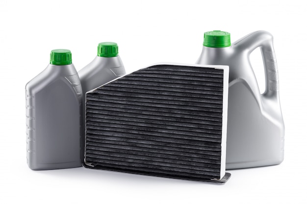 Car filters and motor oil can isolated on white