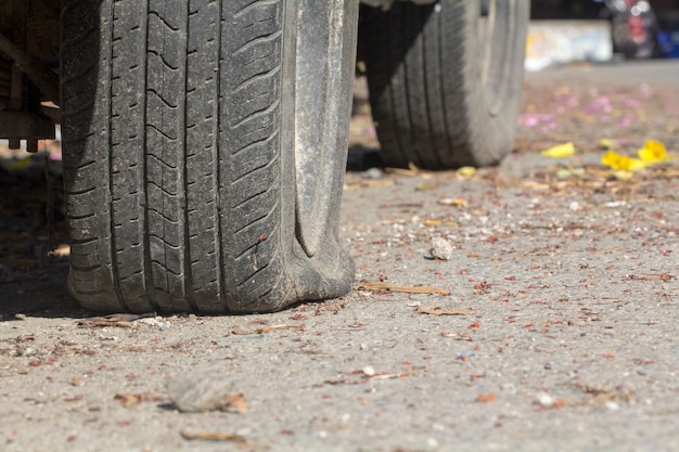 Car flat tire waiting help.