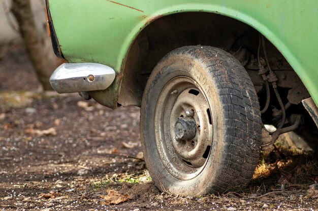 car on the ground wheel old car abandoned