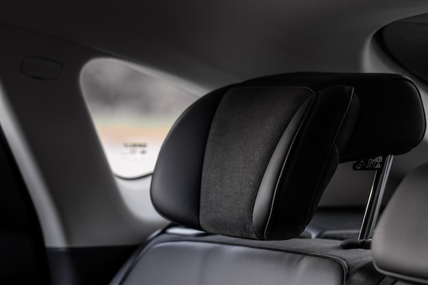 Car headrest seat in modern car. Leather headrest.