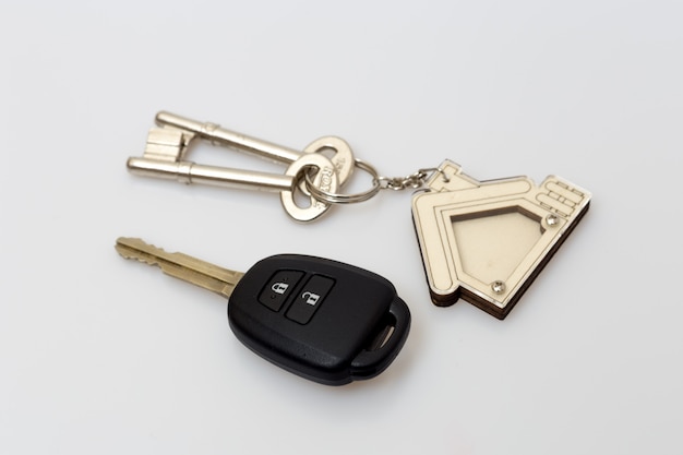 Car and house keys on table. Concept of success.