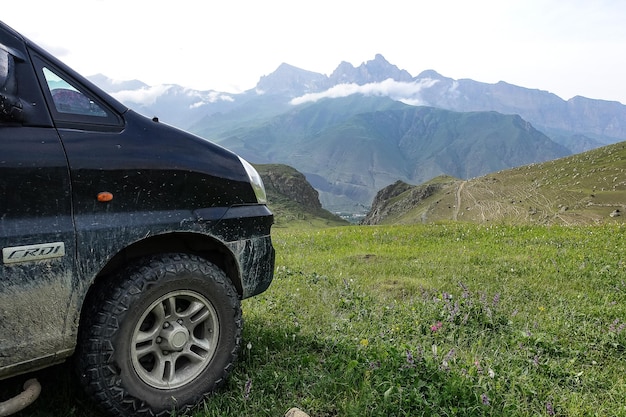 The car is in the gorge of the Cherek River in the vicinity of the Gymyhli tract Caucasus June 2021