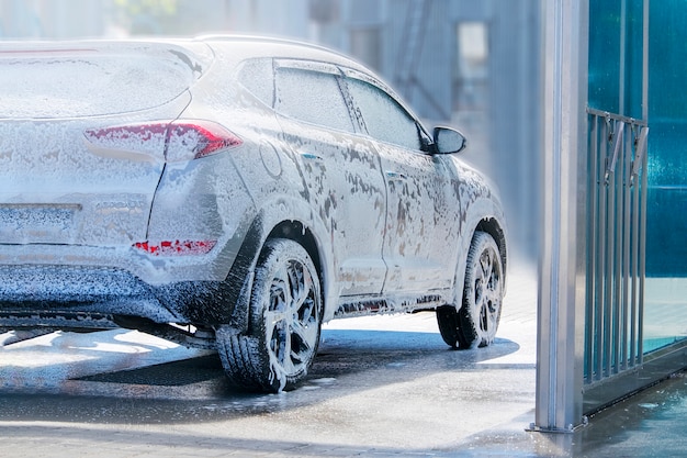 The car is serviced at the sink.