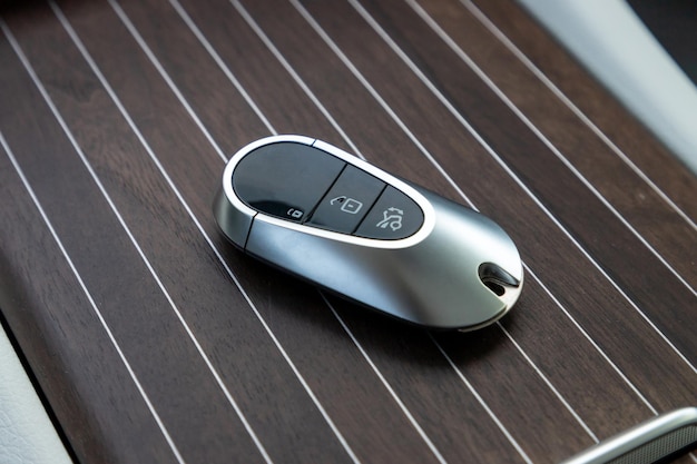 Car key on the colorful background. Wireless remote control system.