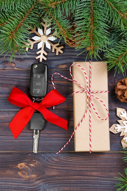 Car key with colorful bow with gift box