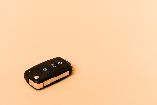 Car keys isolated on beige background