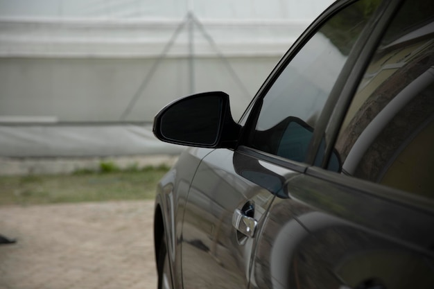 A car mirror in the yard