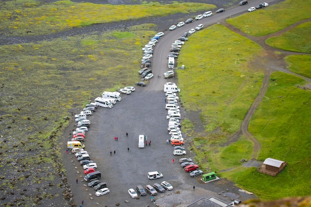 Car parking on the black beach of Reynisfjara Iceland Travel and tourism