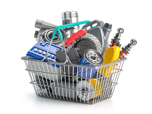 Car parts and auto spare in shopping basket isolated on white