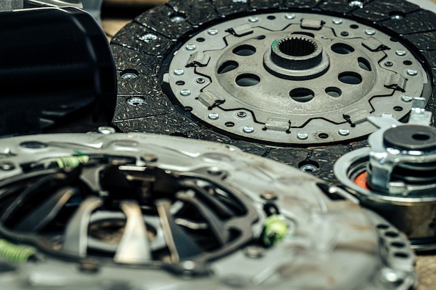 Car parts set on wooden background close up