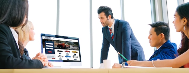 Photo car rental website on computer screen for tourist to rent a car for snugly