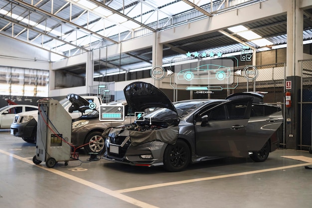 car repair in garage service station with softfocus and over light in the background