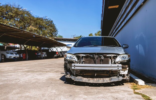 car repair in garage service station with softfocus and over light in the background