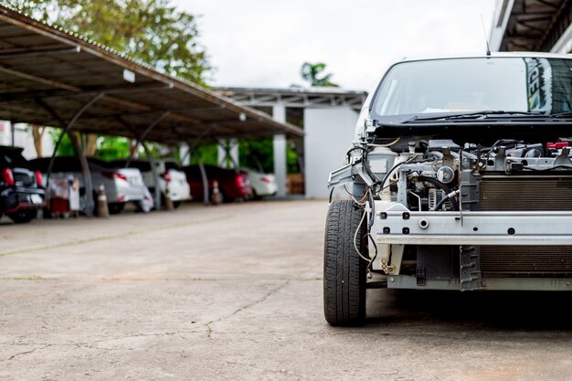 Car in repair station and body shop with soft-focus and over light in the background