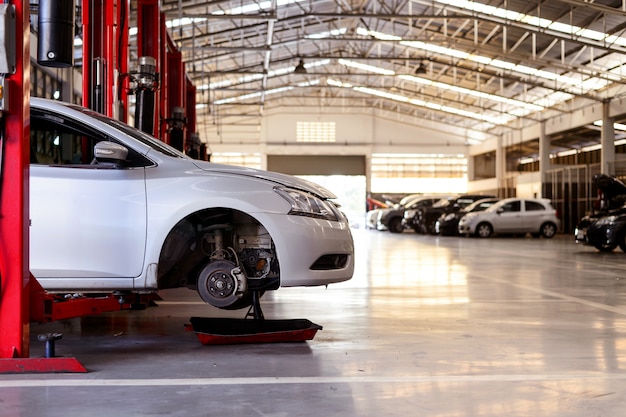 Car repair station with soft-focus in the background and over light