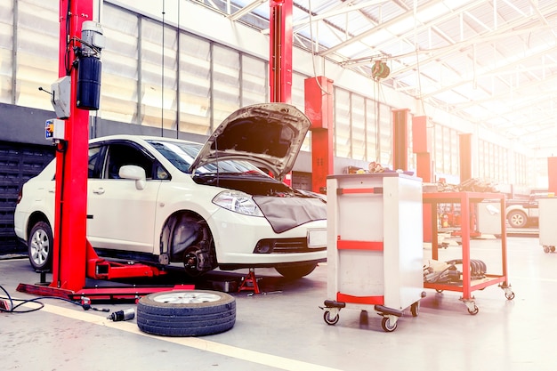 Car repair station with soft-focus in the background and over sunlight