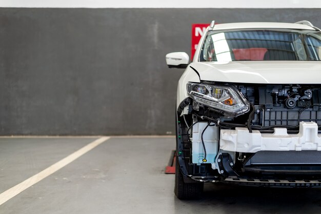 Car repair station with soft-focus and over light in the background