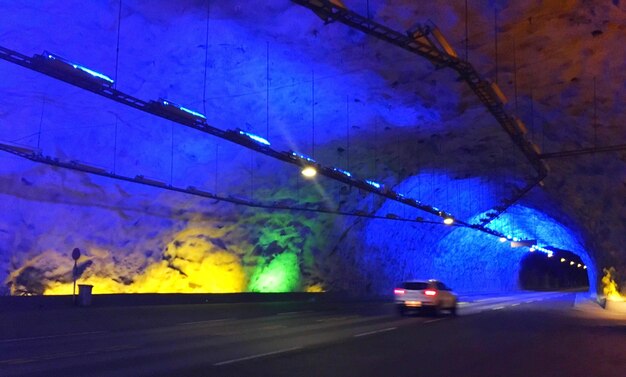 Car on road at night