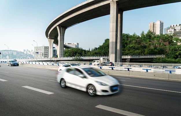 car on the road with motion blur background.