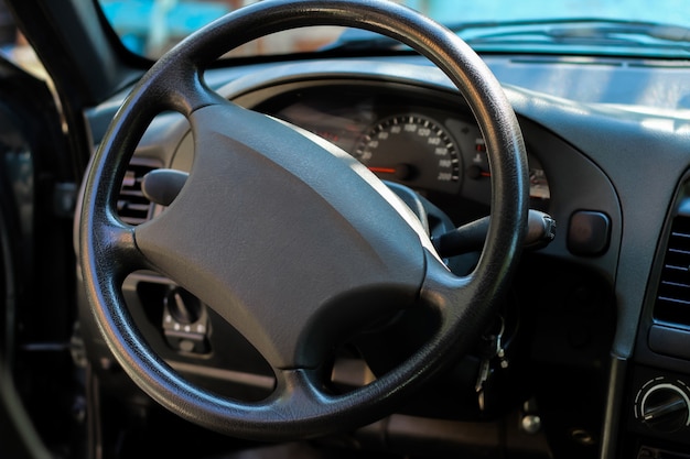 Photo car salon, black steering wheel