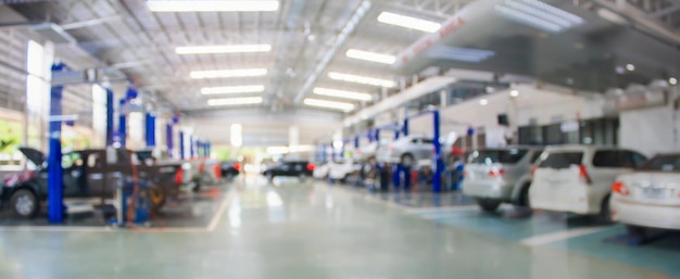 Car service centre auto repair workshop blurred panoramic background