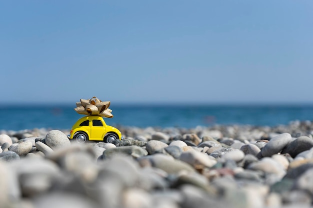 A car standing on the stones on the beach