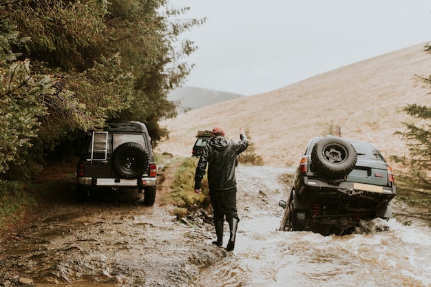 Car stuck in a stream waiting for rescue