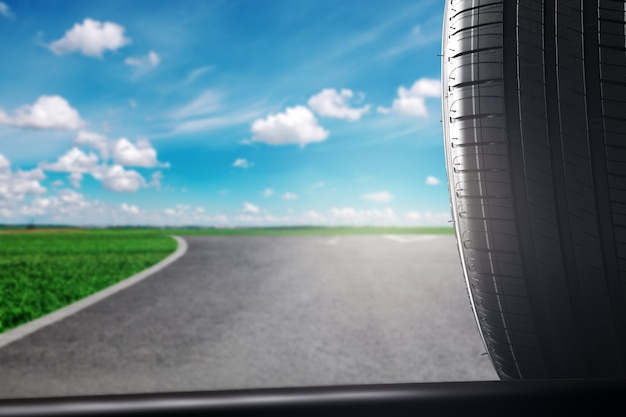 Car summer tires on the road