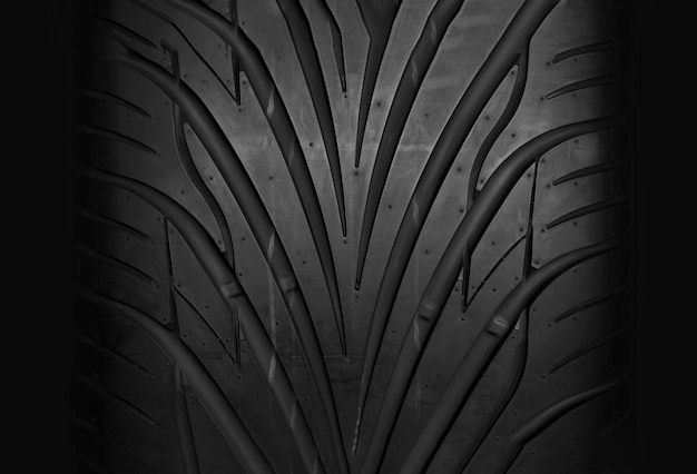 Photo car tire background, tyre texture closeup background.