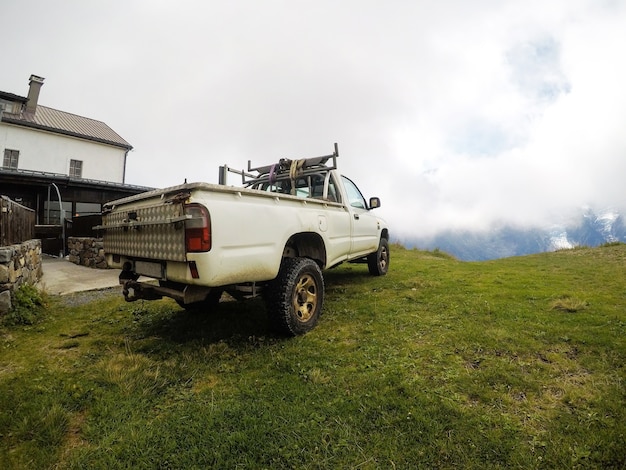 A car on the top of the mountain is a vacation concept