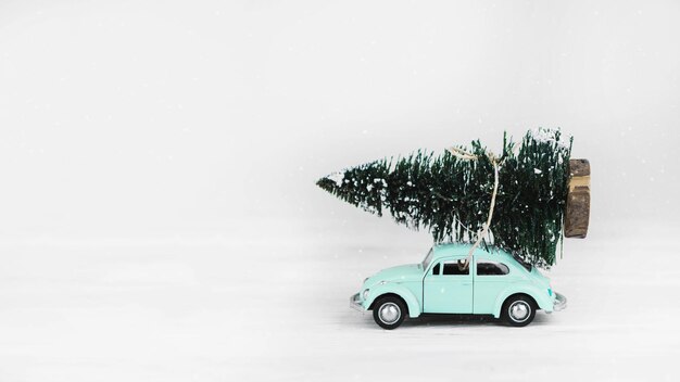 Photo car toy with fir tree top high quality and resolution beautiful photo concept