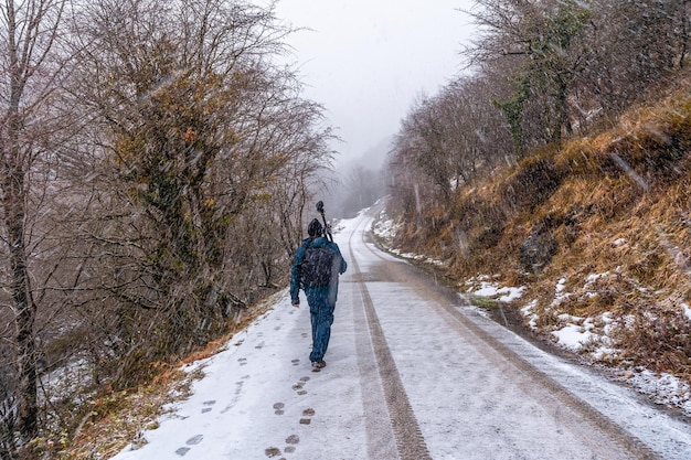 Car tracks on the road to mount aizkorri in gipuzkoa