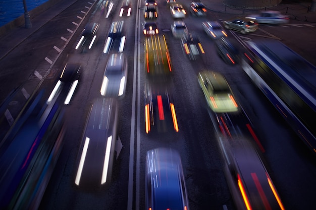 Car traffic at night. Motion blurred background.