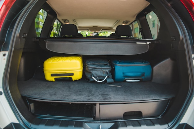 Car trunk with loaded bags. car travel concept. road trip