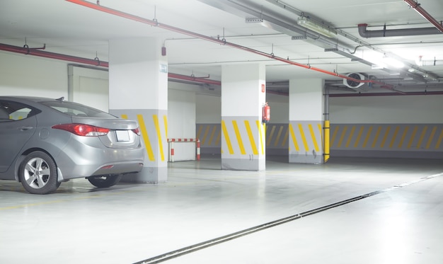 Photo car on underground parking garage.