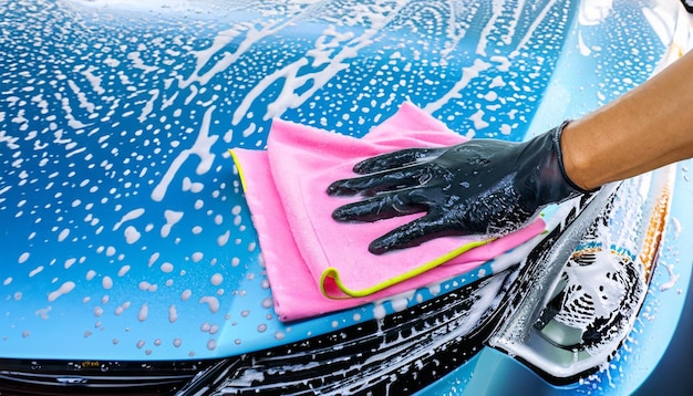 car wash with foam soap car washing service concept