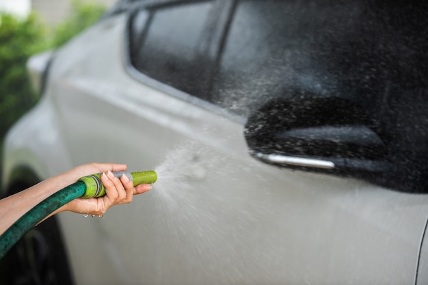 Car washing with spray water