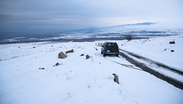 Car on winter mountain