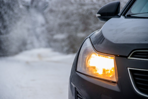 Car in winter on the road