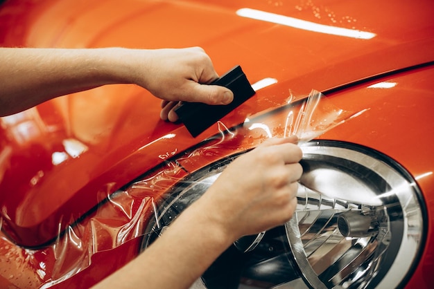 Car wrapping with foil at car service