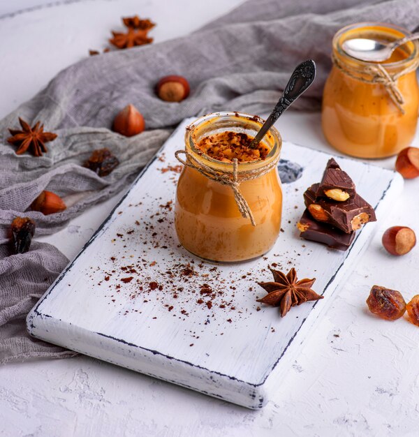 Caramel dessert Toffee in a glass jar 