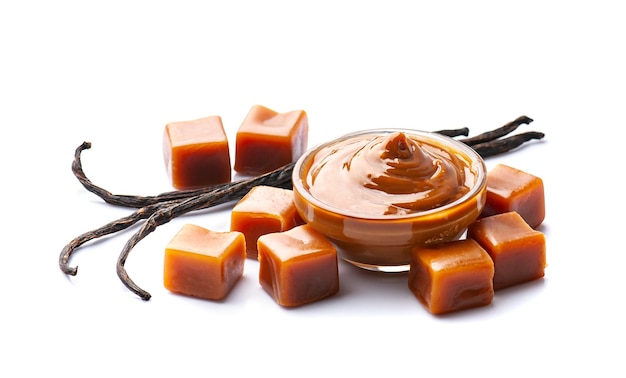 Caramel saus met vanille stok en caramel snoep