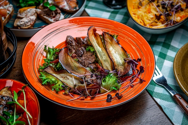 Caramelized chicken liver with eggplant chips