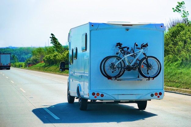 Caravan with bicycles on the highway in Czech republic.