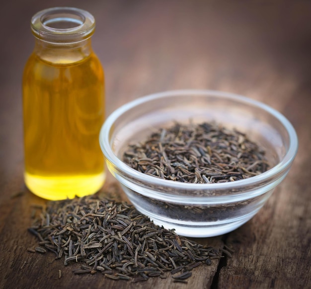 Caraway seeds with essential oil in glass bowl