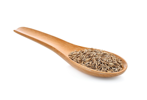 Caraway seeds in wood spoon