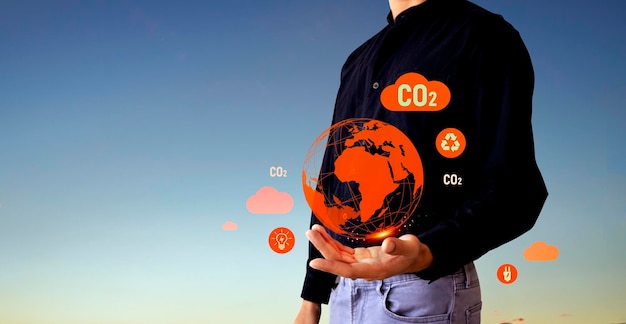 Фото Концепция углеродной нейтральности и чистого нуля зеленая центральная икона сети на фоне заката