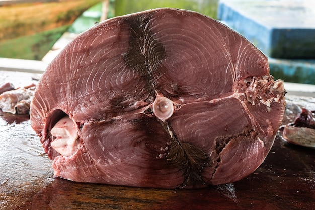 Carcass of sliced bluefin tuna on the table. Close-up.