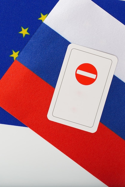 Card - access forbidden on flags of Russia and European Union. Background