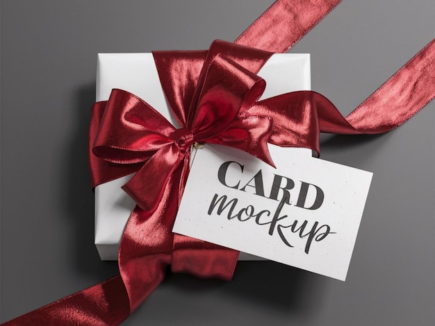 a card with a red bow that says card design